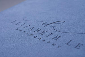 custom logo - laser etch on velvet and suede textile
