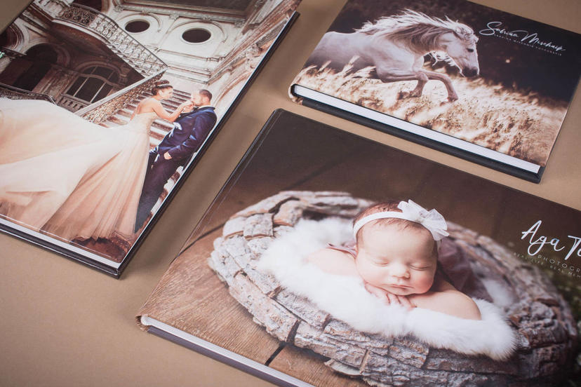 Fotoalbumy ze zdjęciami portfolio dla fotografa sesje dziecięce ślubne nphoto