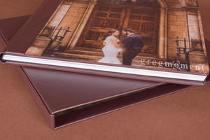 side shot of wedding album with acrylic cover