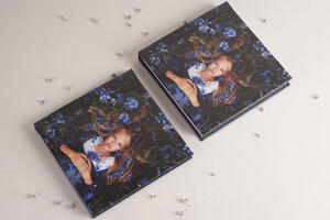 Thickened photo album spreads