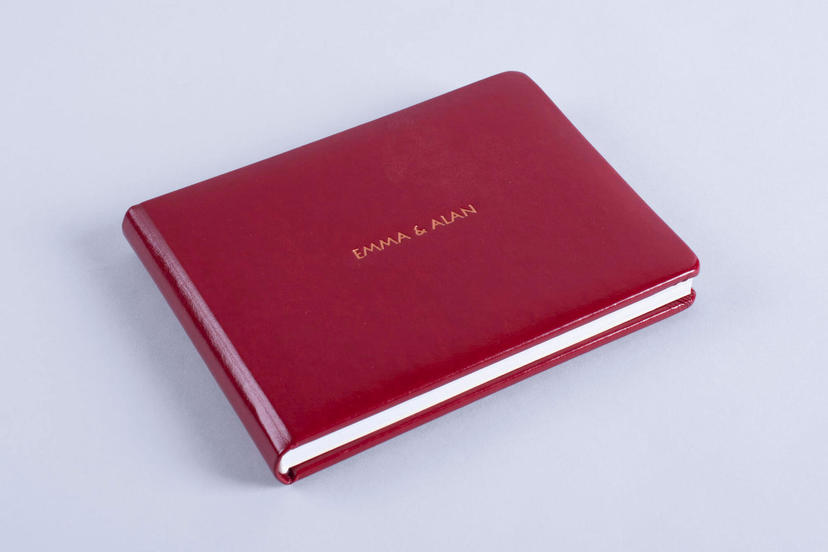 Exclusive embossed debossed text on the cover photo album seam around the edge nphoto printing lab for professional photographers luxury high end product